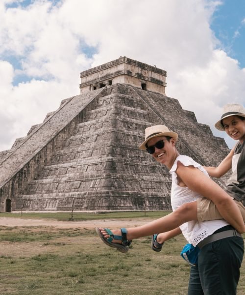 Family vacations, mother and daughter together, pyramid in Chichen Itza, Yucatan, Mexico